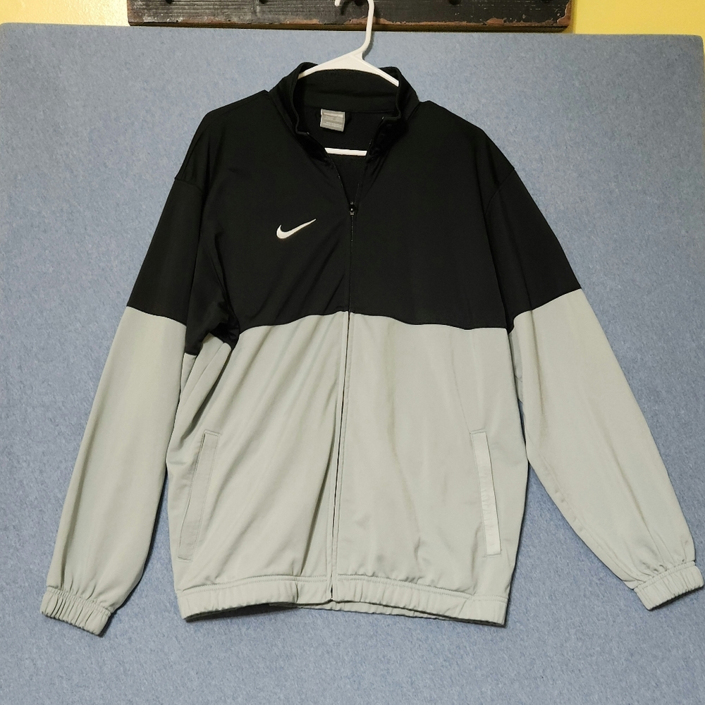Nike two tone full zip fleece lined jacket. Size large.